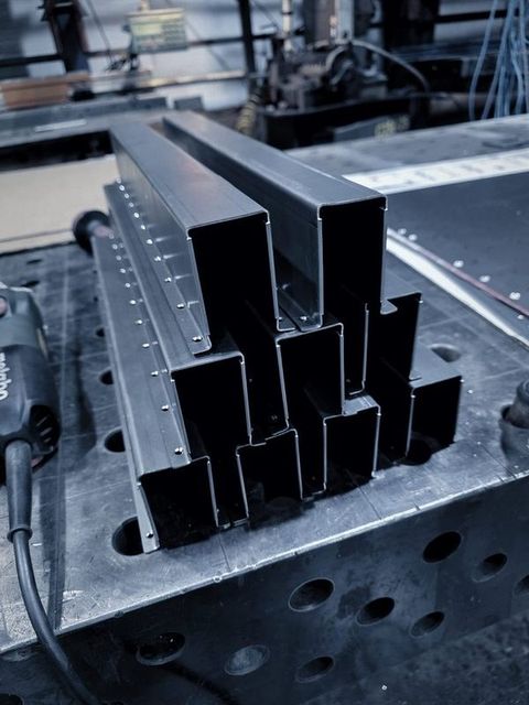 Formed channels stacked in a pyramid on the fixture table